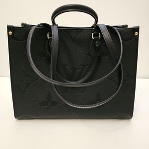 Auth Louis Vuitton On the Go mm black keather handbag tote